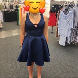 Satin Navy blue party dress with pockets only worn once.